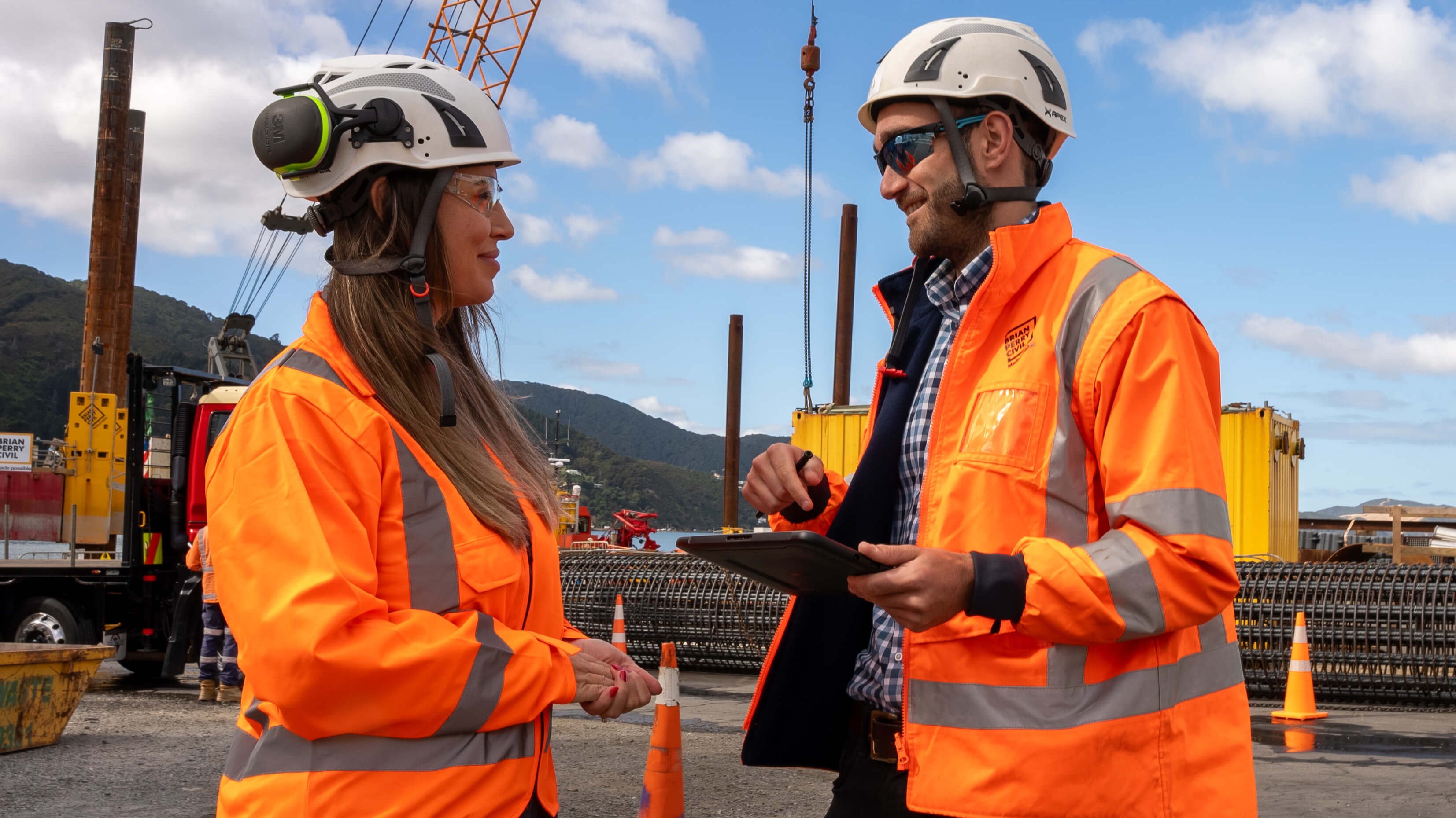 Two construction workers having a conversation