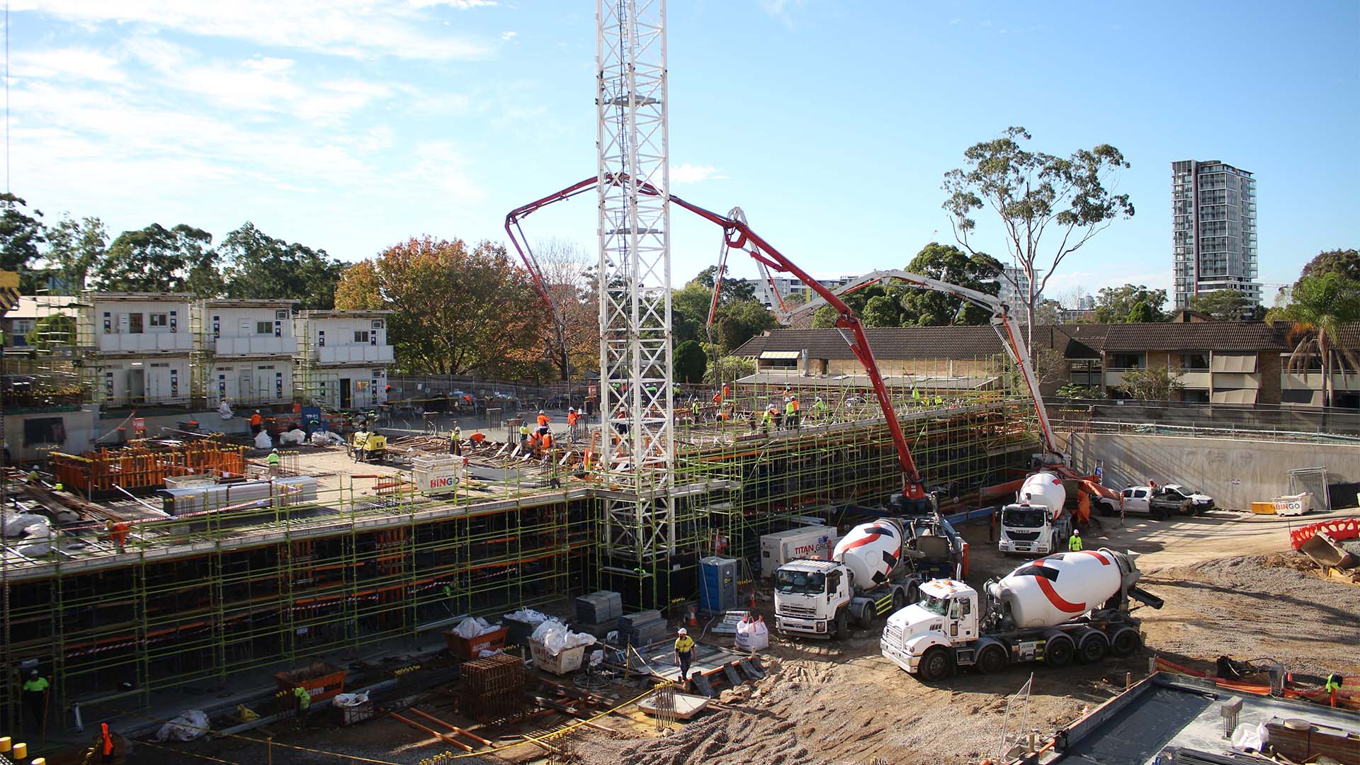 Concrete mixer trucks on site