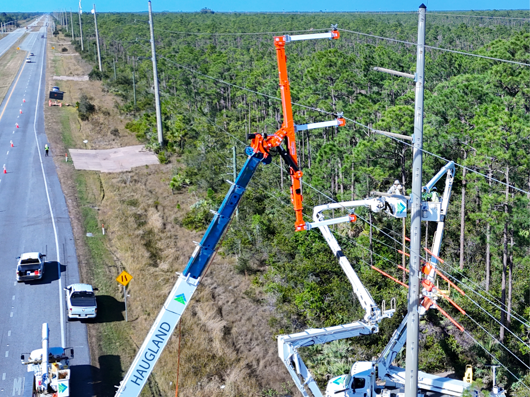 Haugland cranes clearing power lines