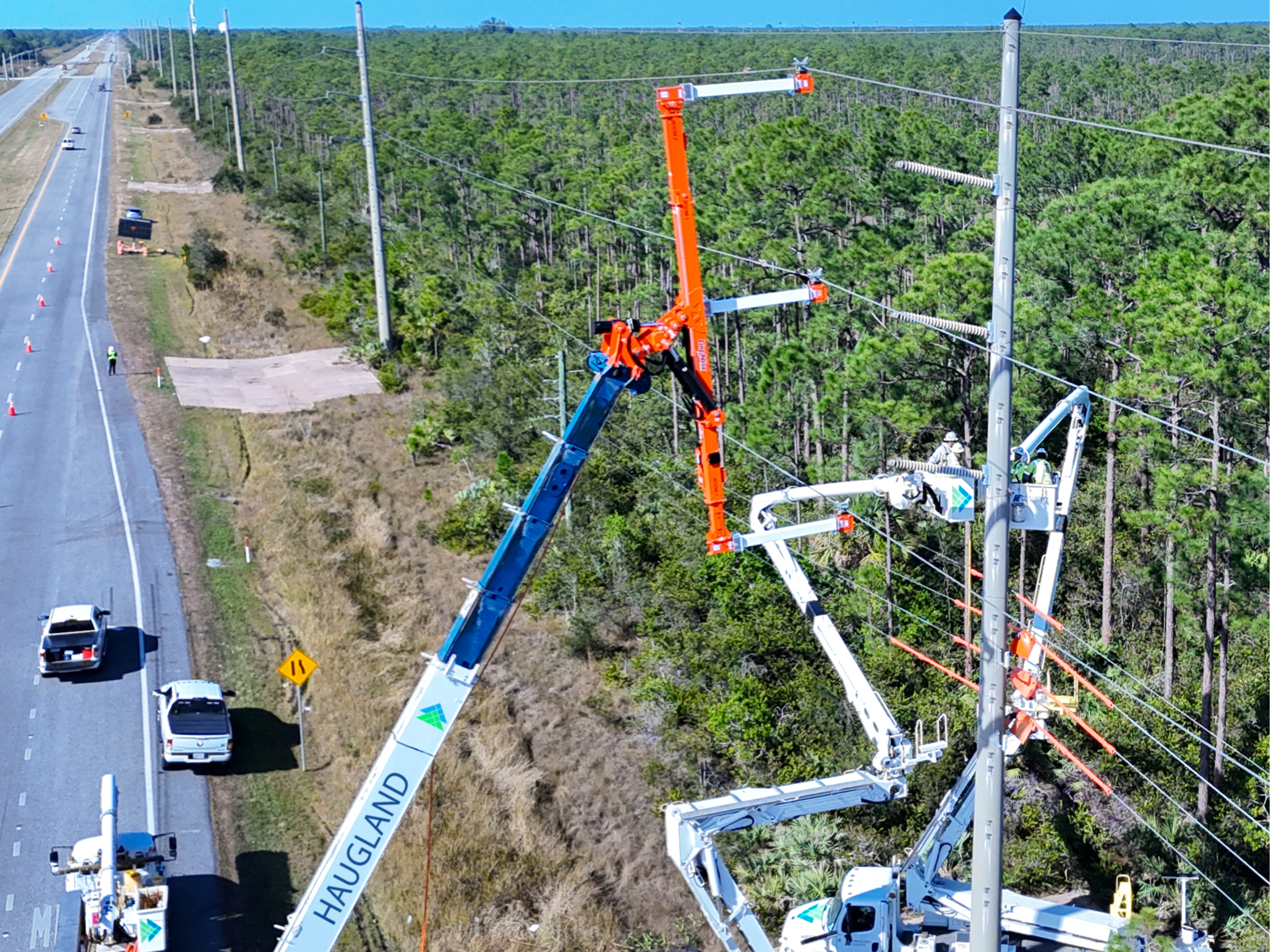 Haugland cranes clearing power lines