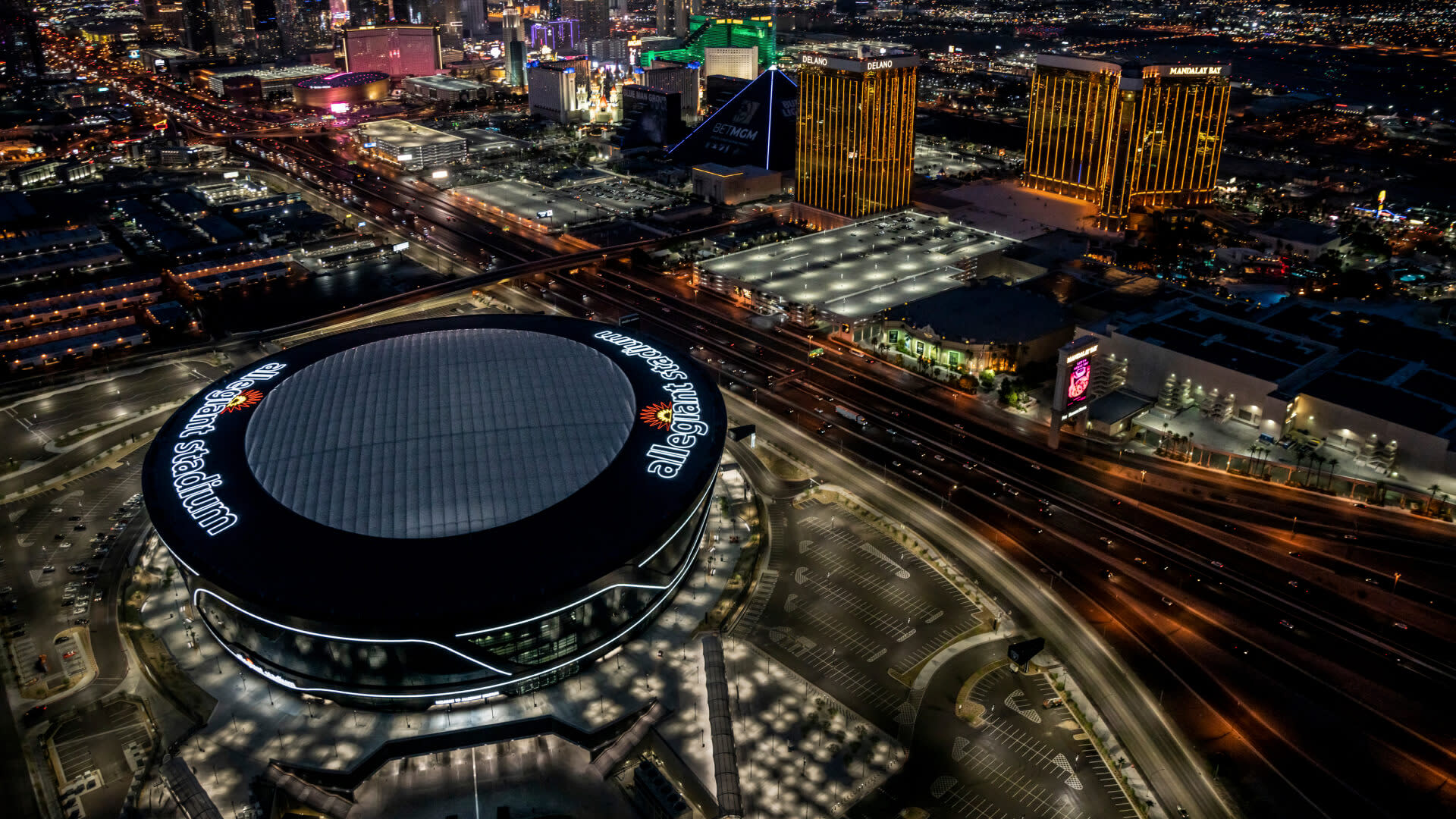 Aerial view of Raider's Allegiant Stadium at night time