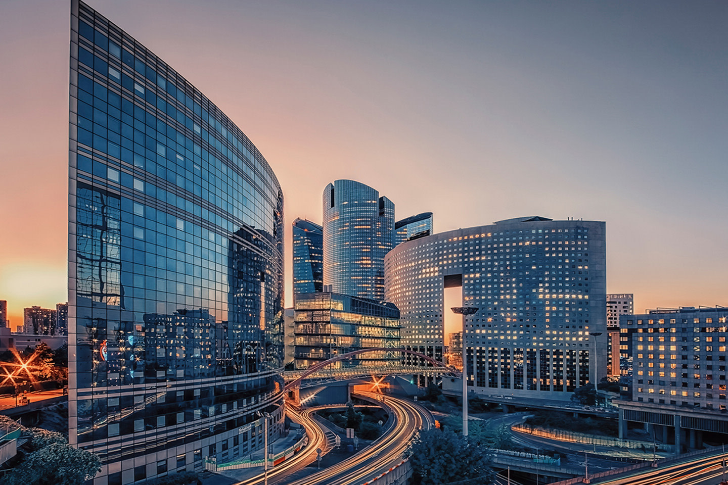 A city's downtown with large buildings and highways