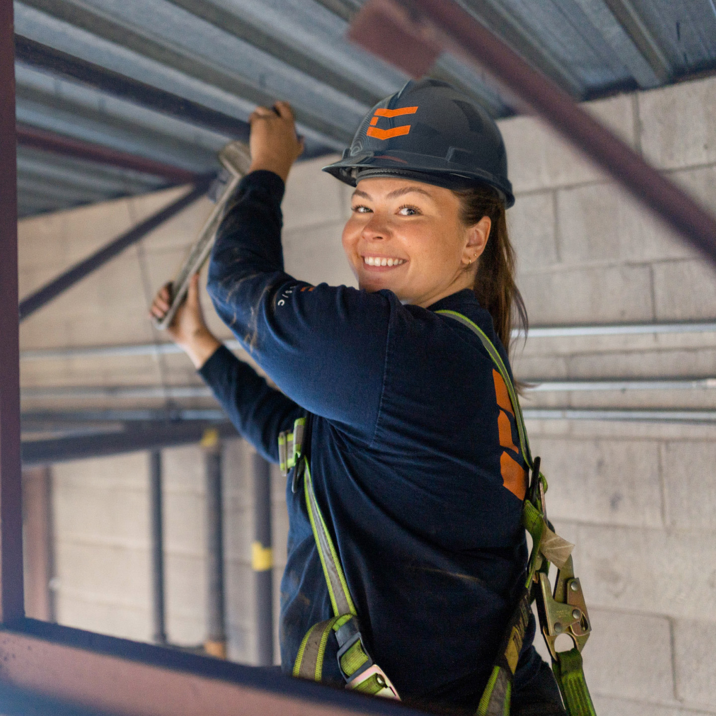 A woman contractor smiling