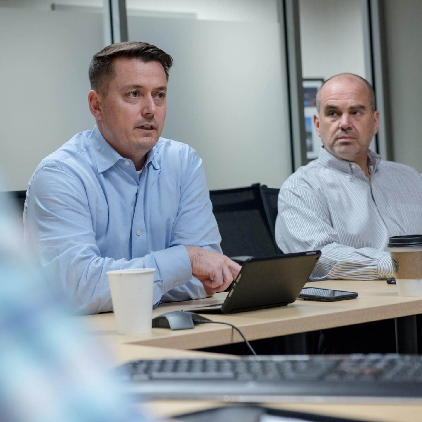 Employees collaborating at a table