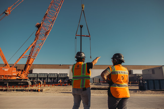 Compass Datacenters Employees in front of a datacenter build
