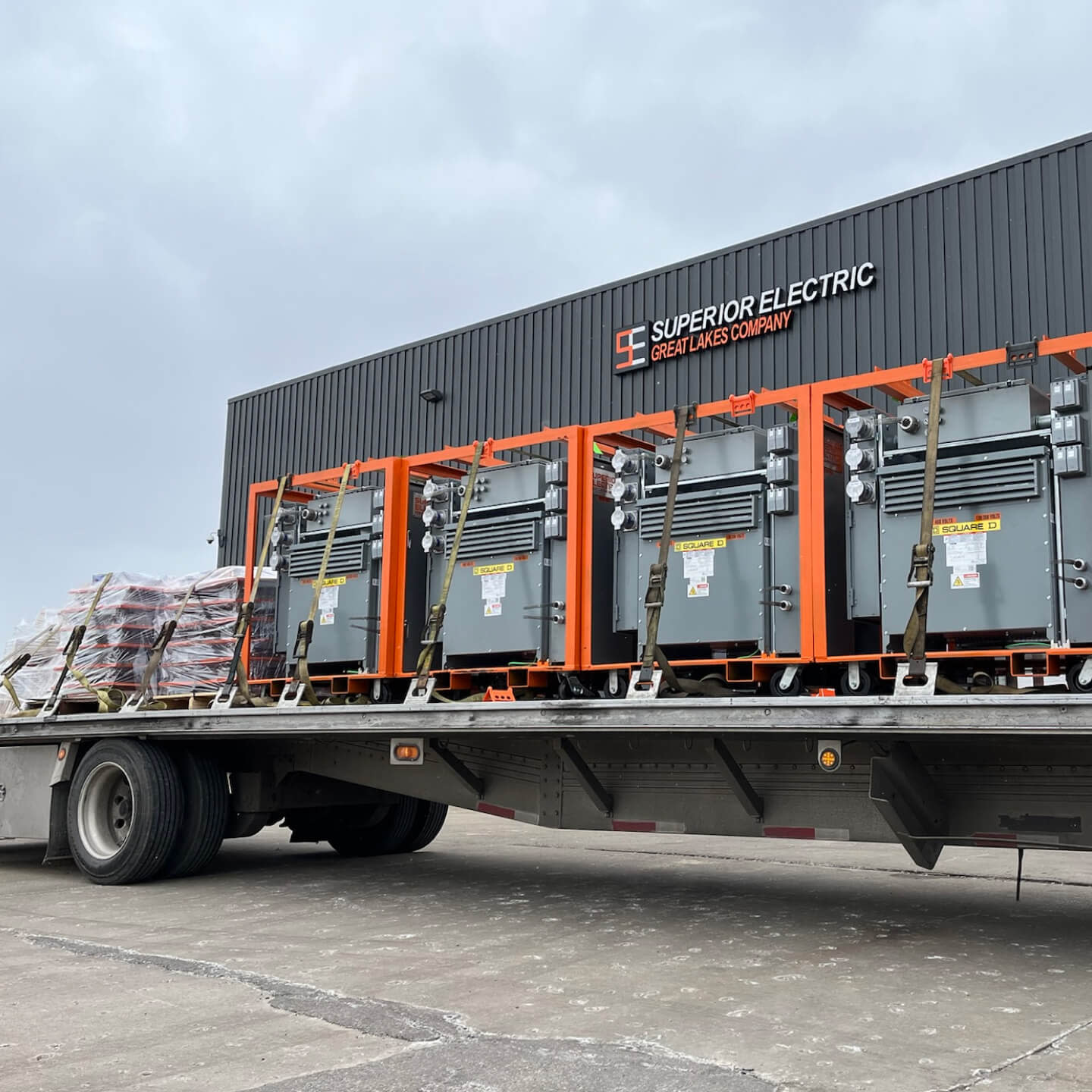 A truck carrying a Superior Electric Great Lakes Company container