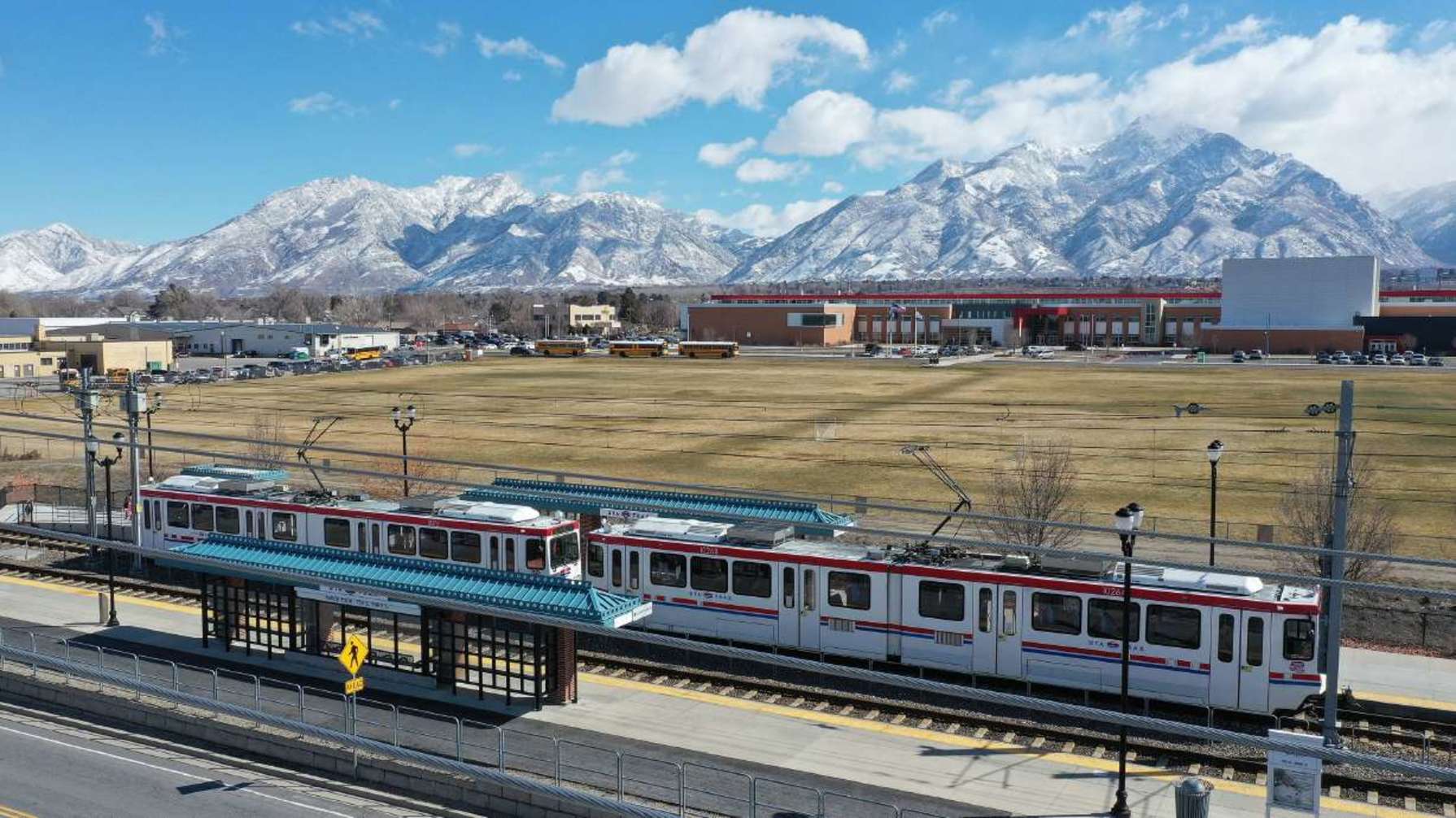 A Utah Transit Authority TRAX train stops at the Sandy Expo Station in Sandy.