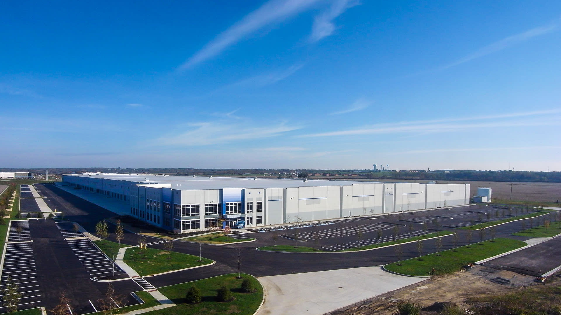 Aerial view of a factory's parking lot