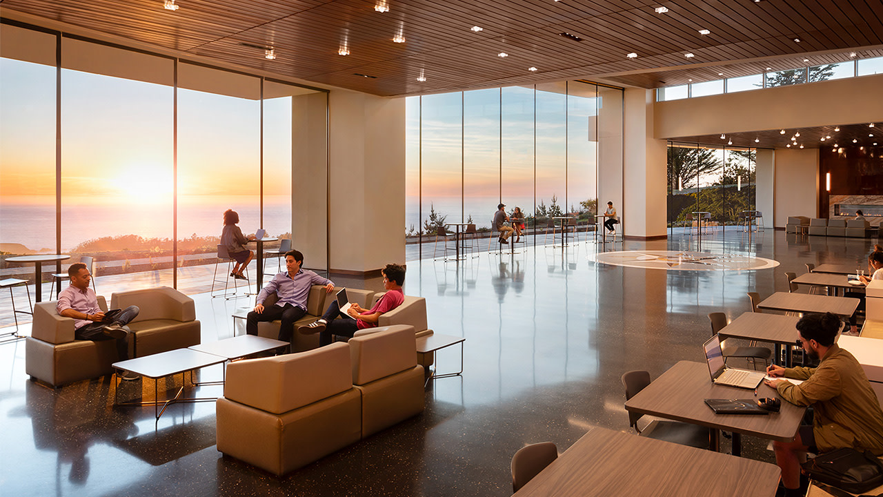 People sitting in a lounge room with large windows