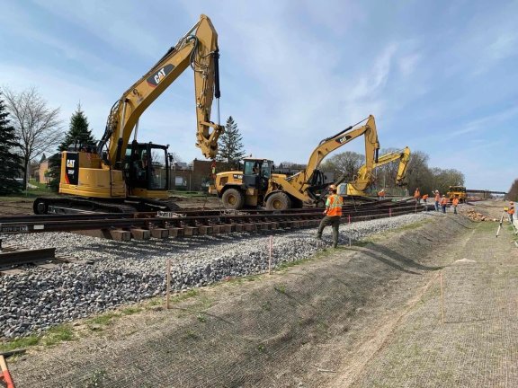 rail track being placed and set up on the ballast bed