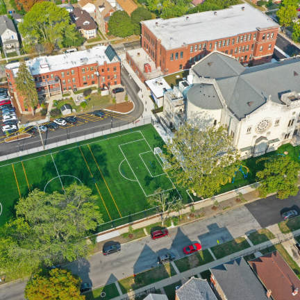 Aerial view of a town's school and soccer field