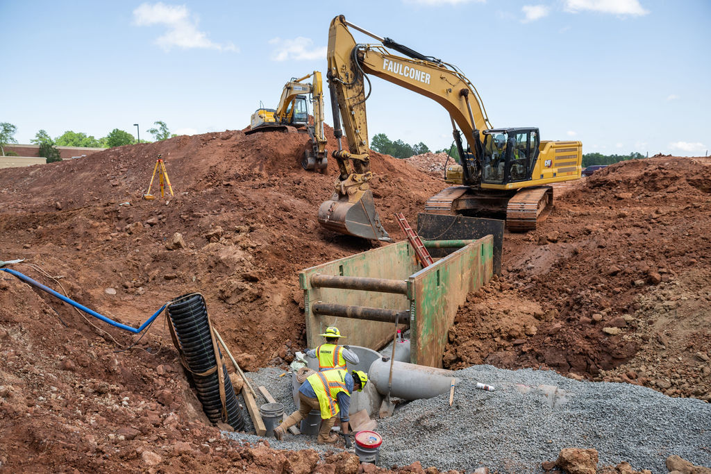 Excavator and Faulconer employees