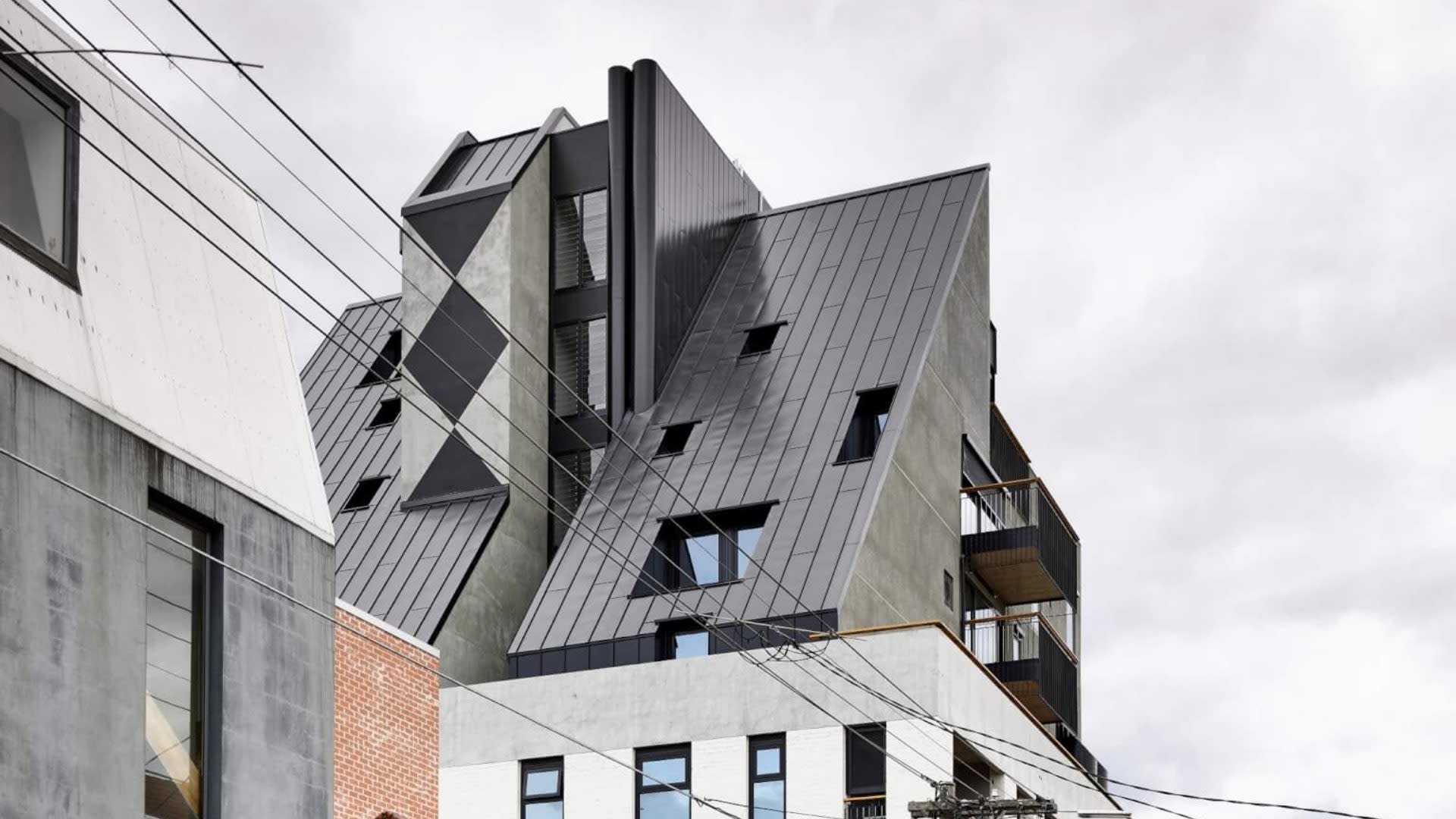 modern black slanted rooftop with multiple windows