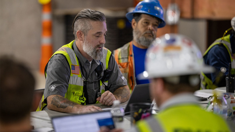 Construction workers having a meeting