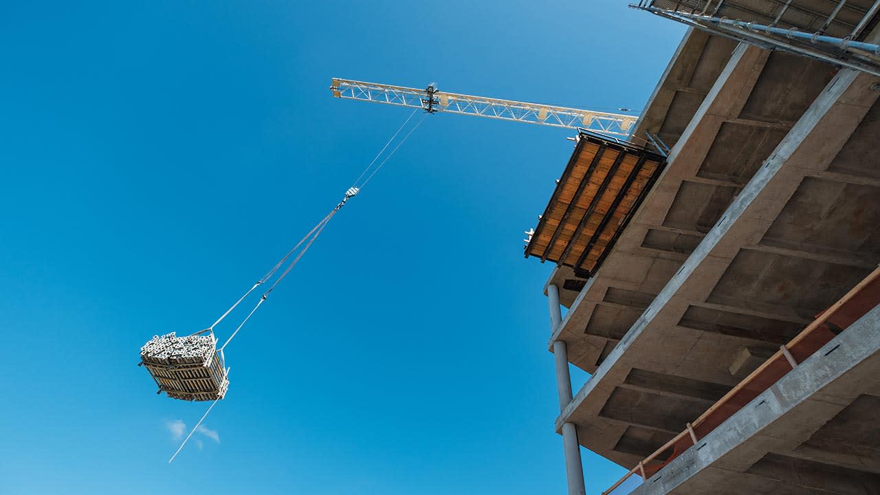 Transporter moving pieces around in a construction site