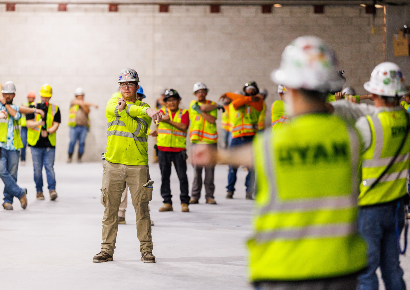 Construction workers stretching out