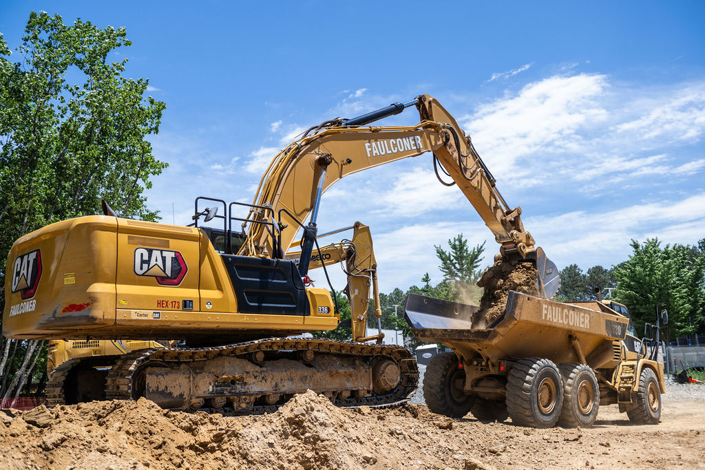 Faulconer dump truck and  Excavator