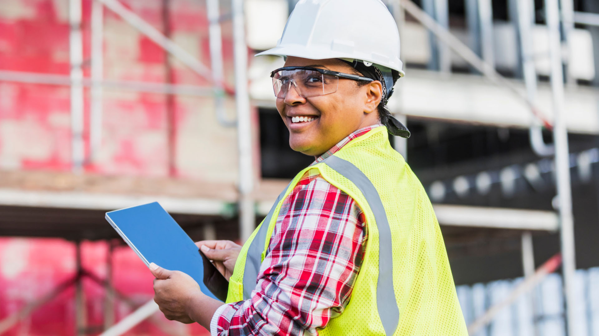 Woman contractor smiling on the construction site