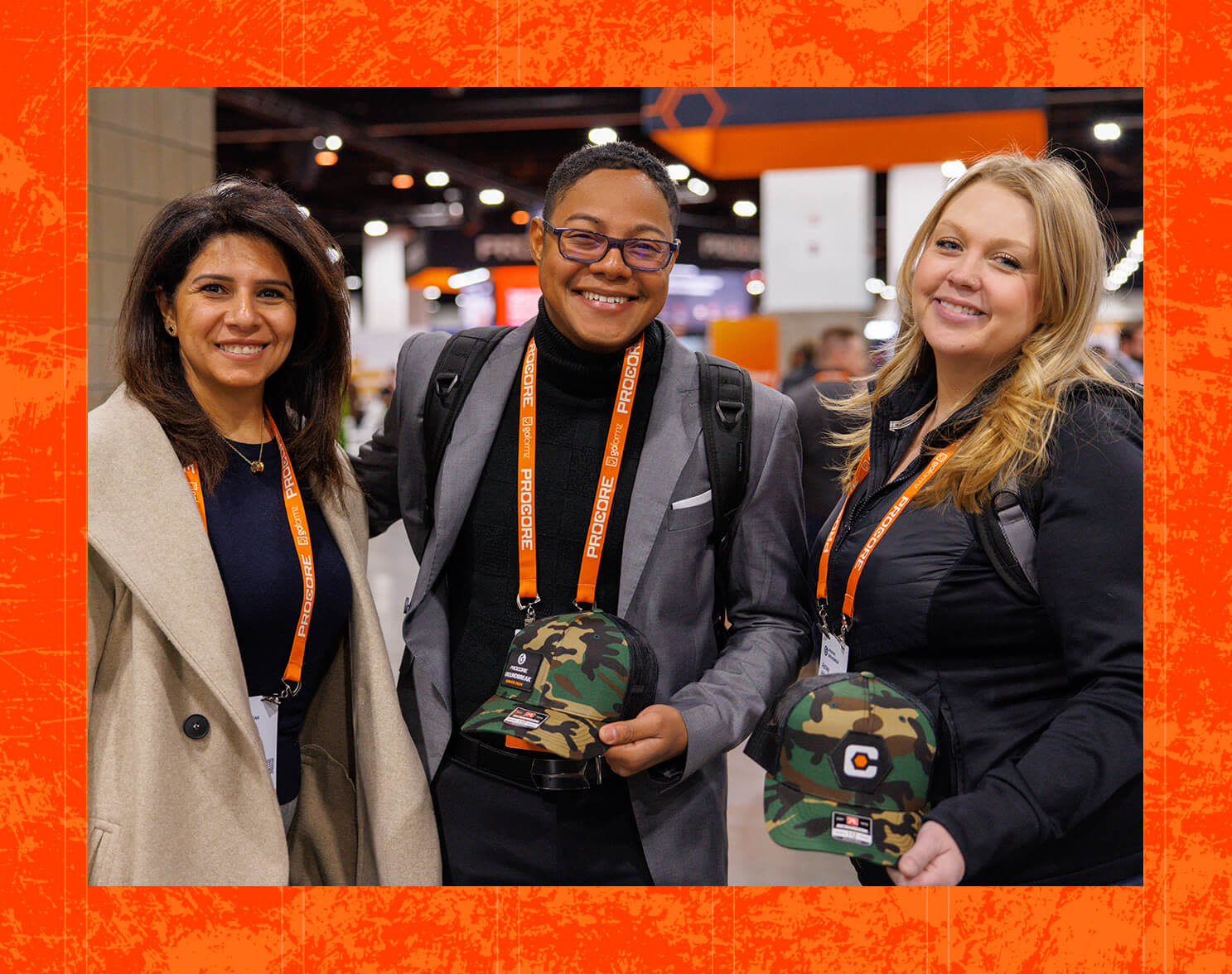 Three women posing for the camera at Procore's Groundbreak event