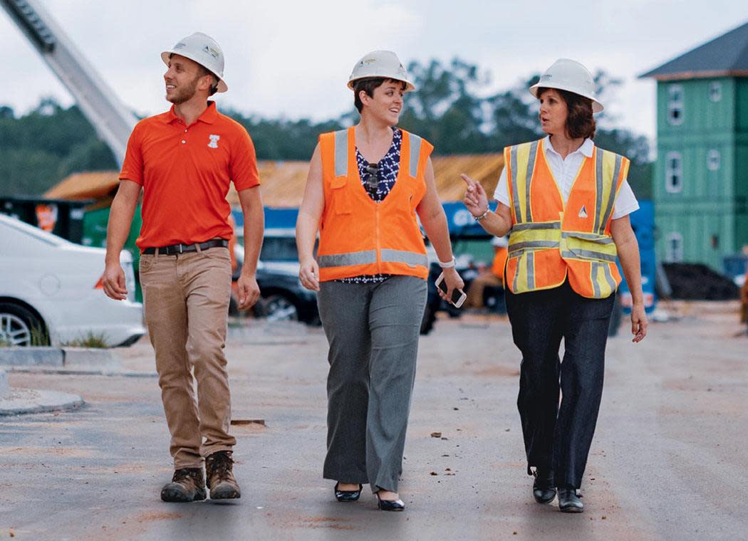 Contractors walking on site