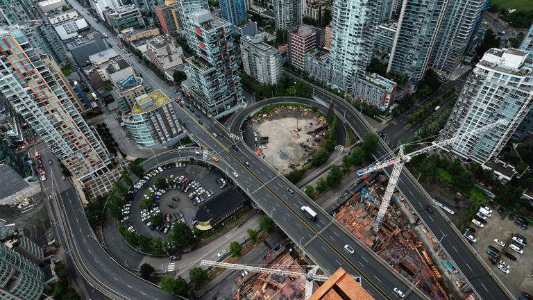 Arial view of city freeways and buildings