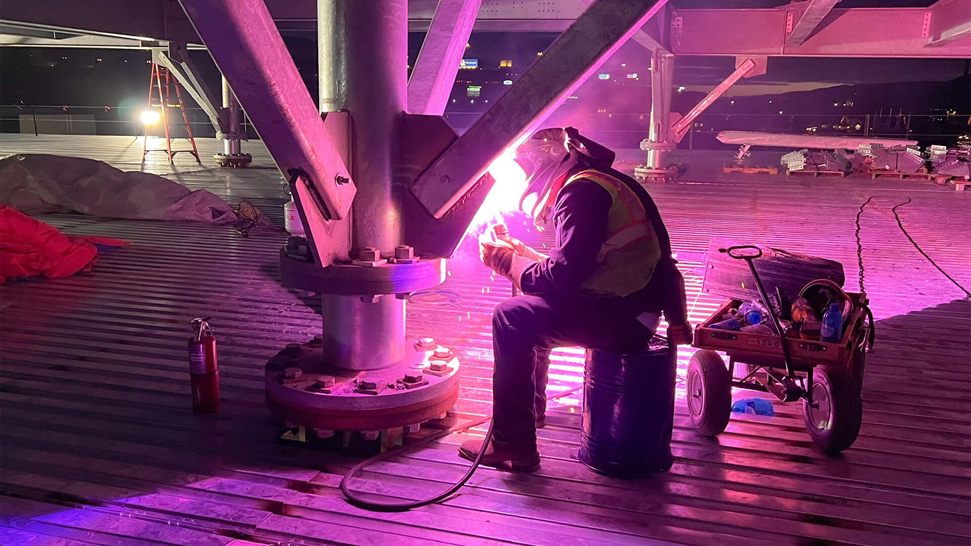 Man wielding a steel structure