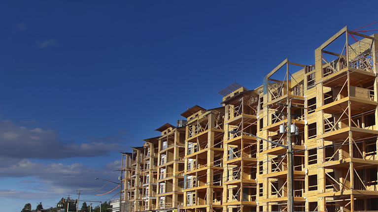 A large construction site featuring a building in progress