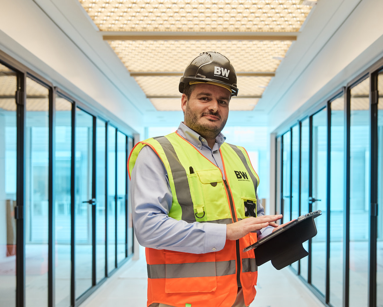A contractor using a tablet