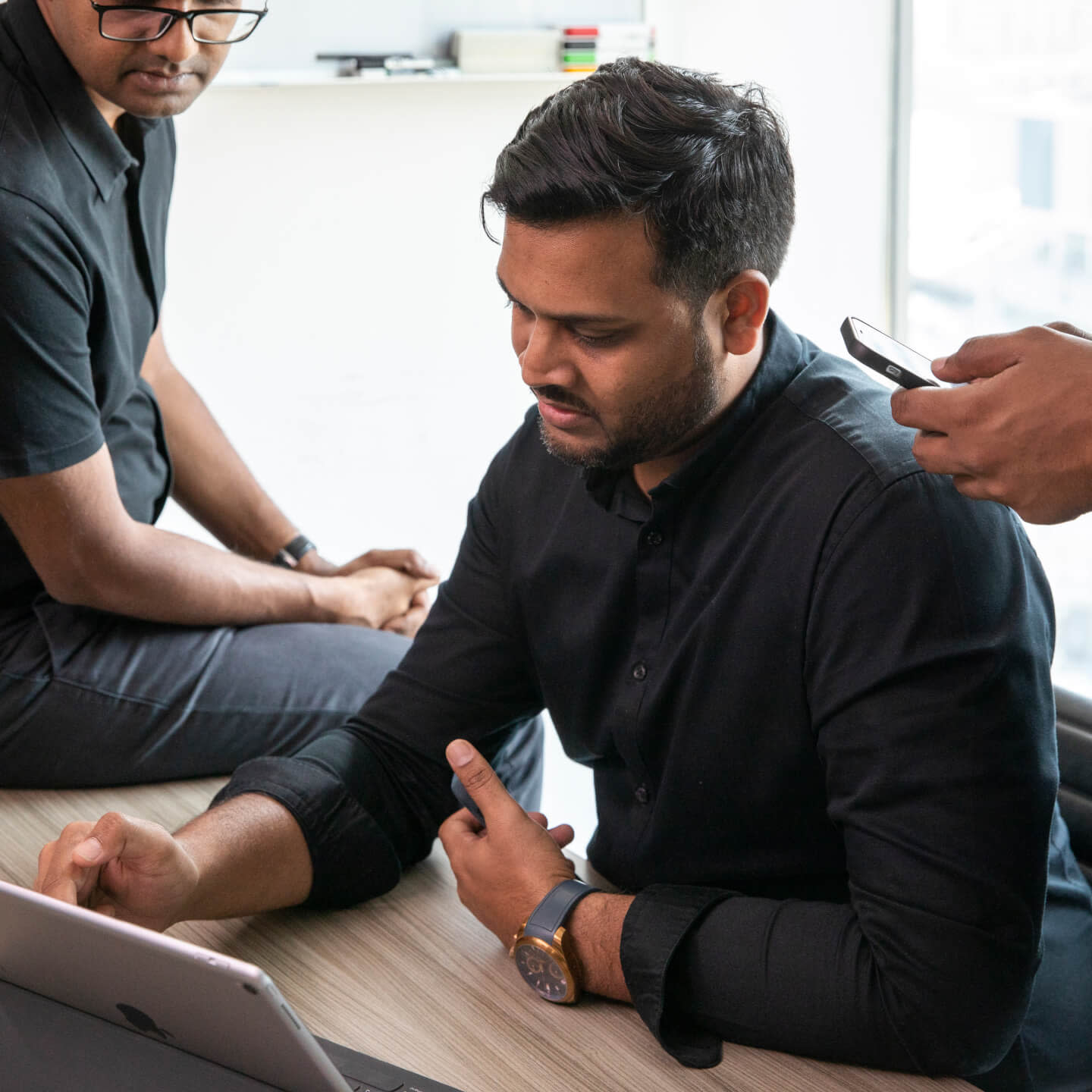 Construction Industry professionals using Procore in the office