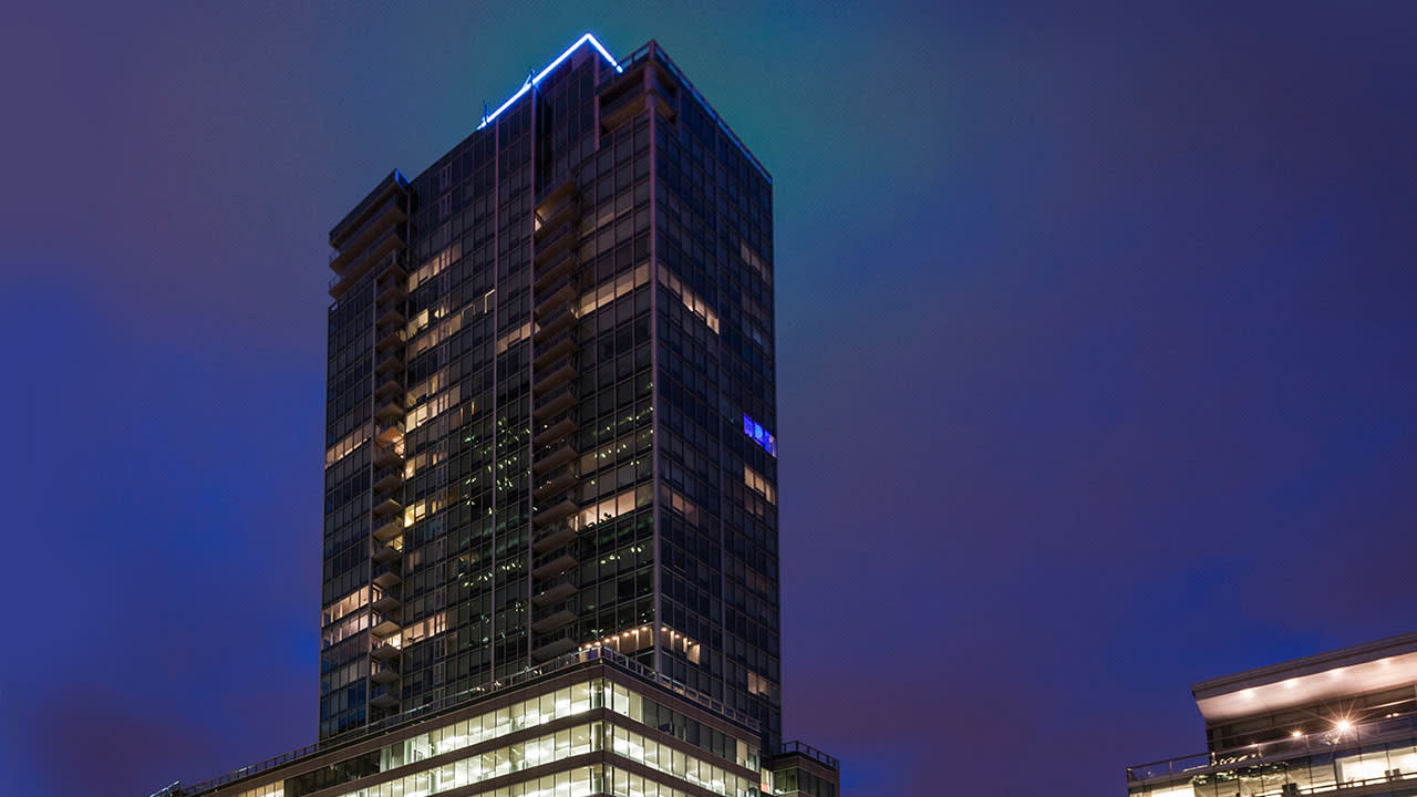 Low angle view of a lit up building at night
