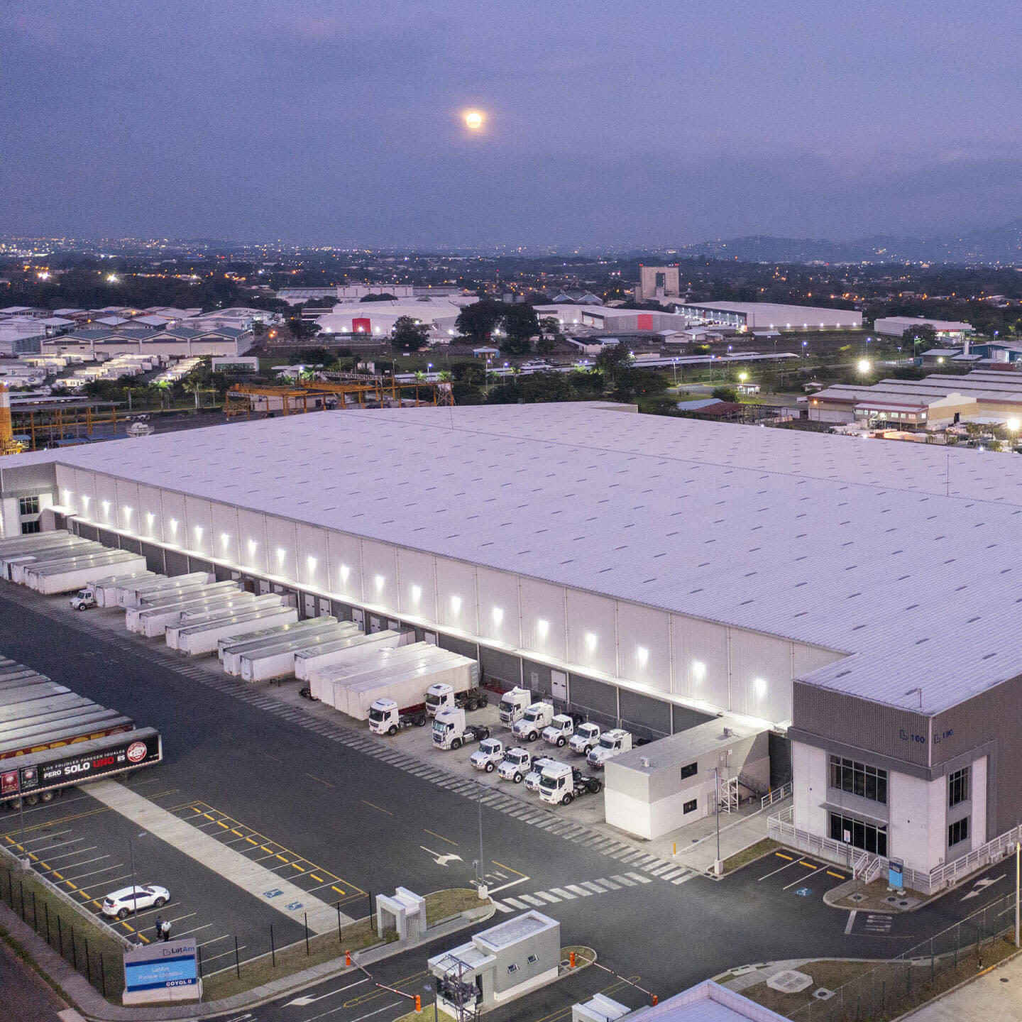 Aerial view of a company's entrance at night