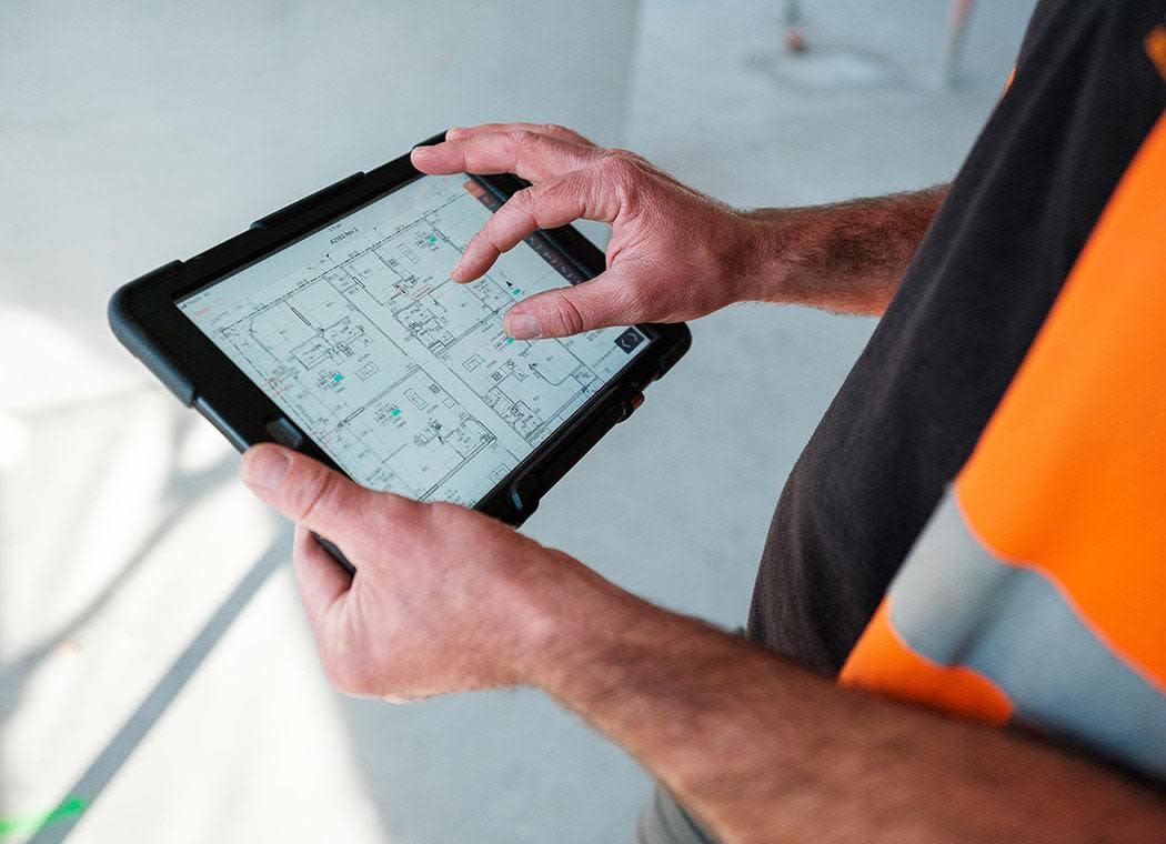 Customer viewing a site drawing on a tablet
