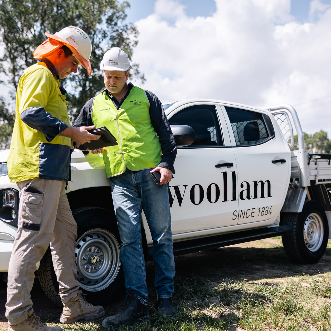 Two contractors inspecting a site