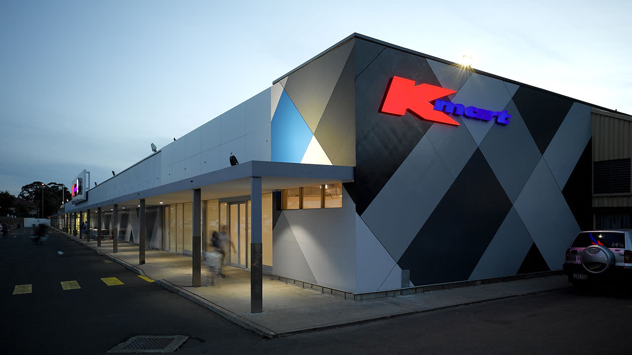 Horizontal view of a Kmart's entrance