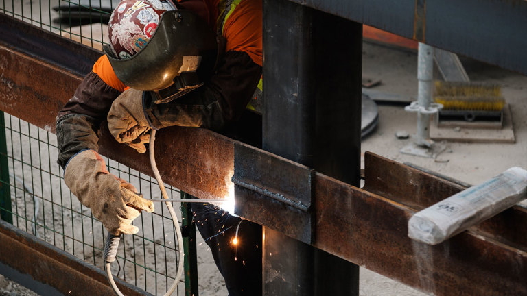 Construction worker welding