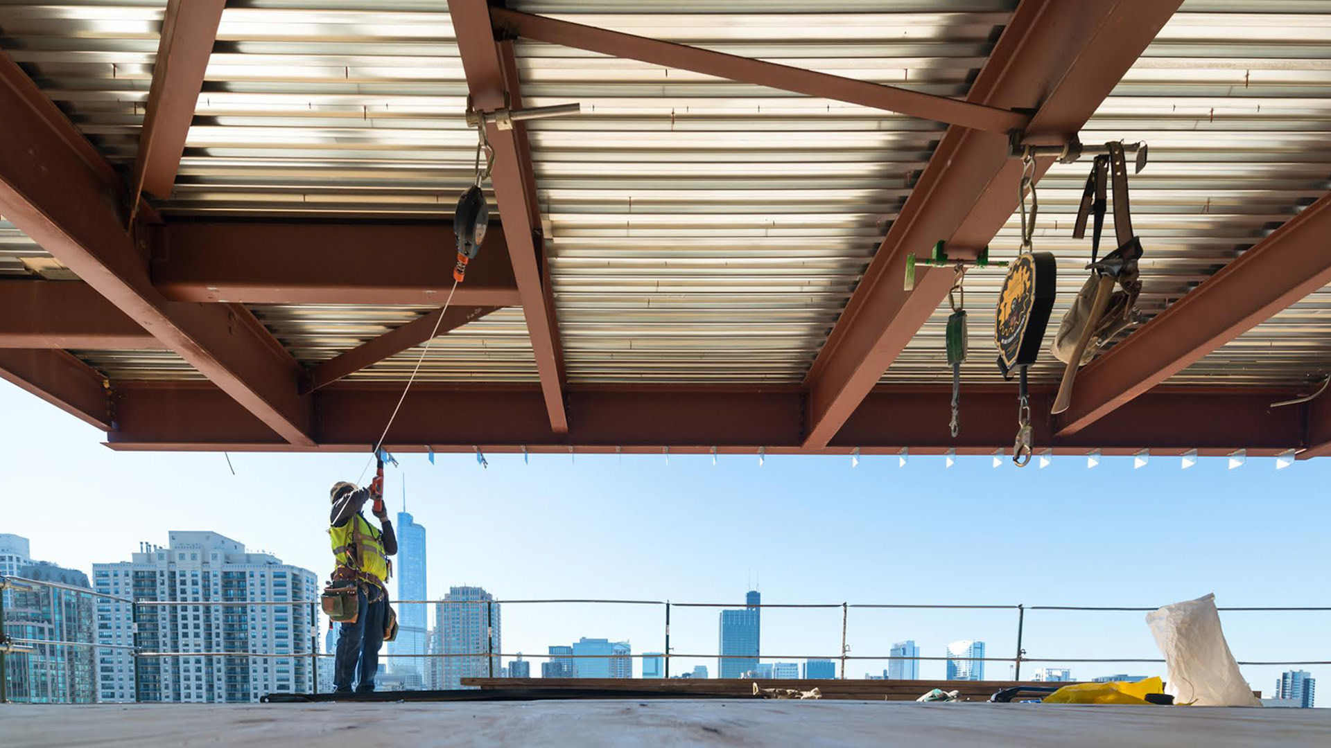 A construction worker working on a roof