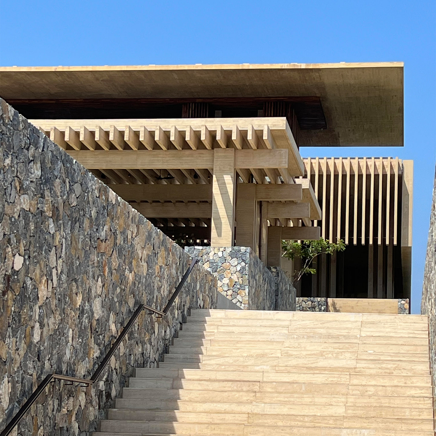 A stone stairs leading up to a building