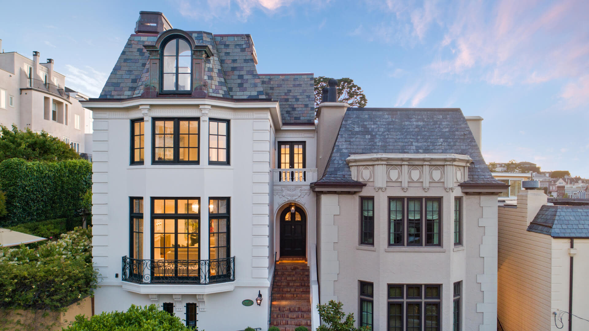 Photography of a 3 story house's entrance