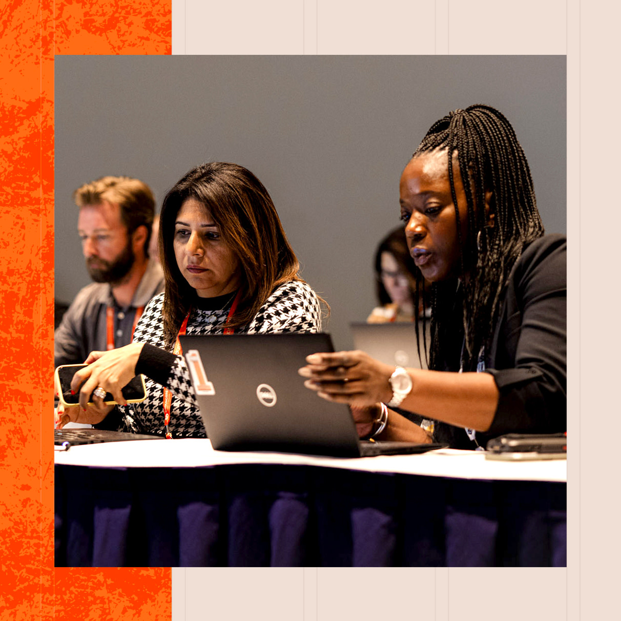 People using their laptops at Procore's Groundbreak event