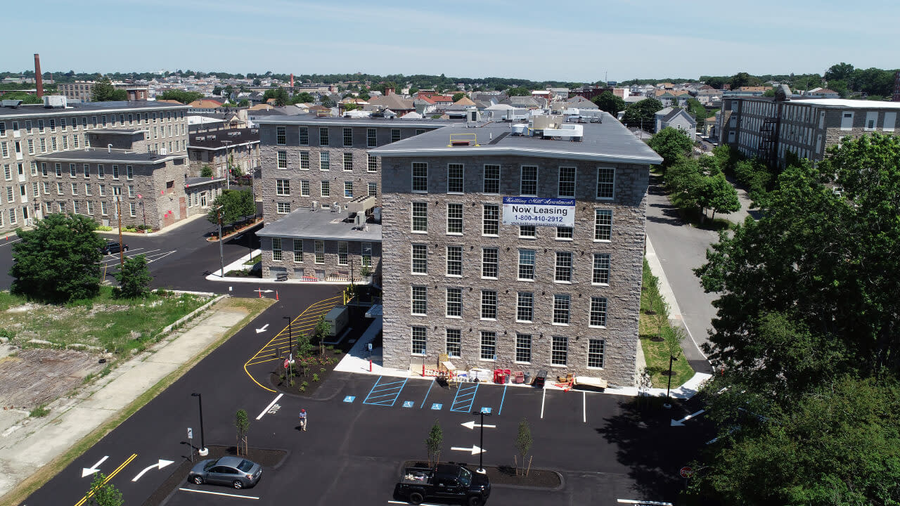 Aerial view of building oper for lease