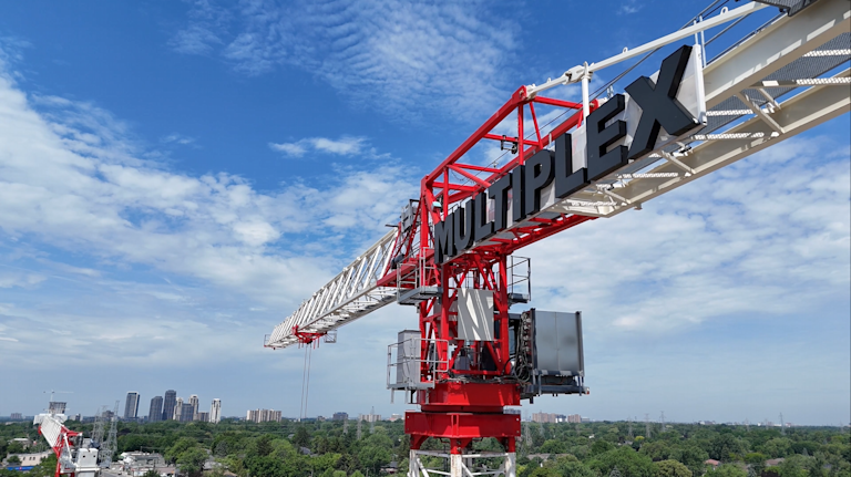 crane with the multiplex logo on it