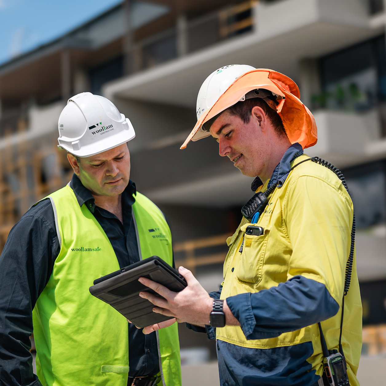A contractor crossing his arms in front of his body posing for the camera