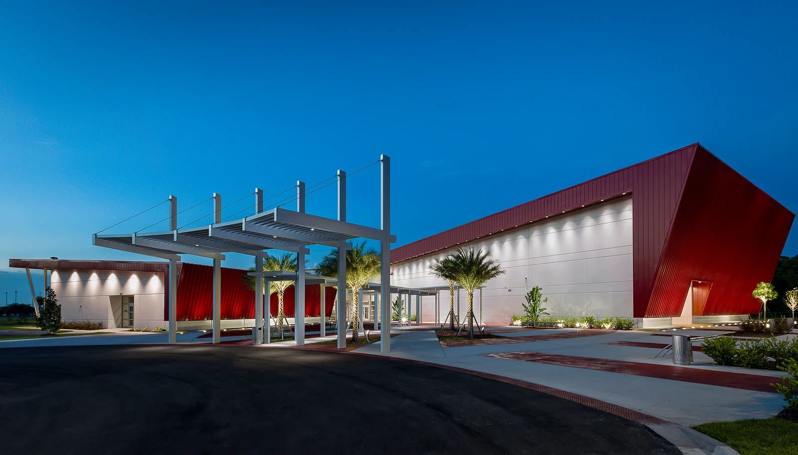 A red building illuminated at night