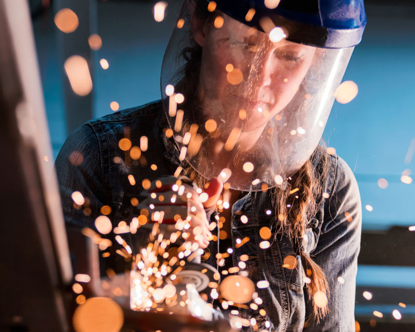 Construction worker welding a piece