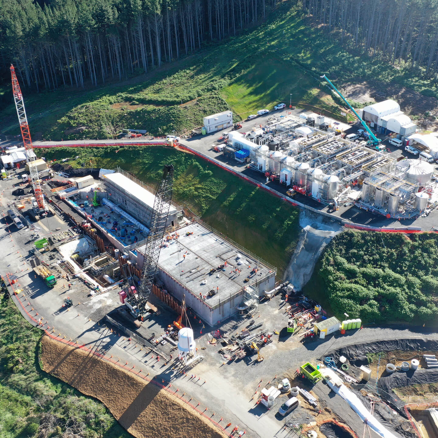 Aerial shot of a construction site in the woods