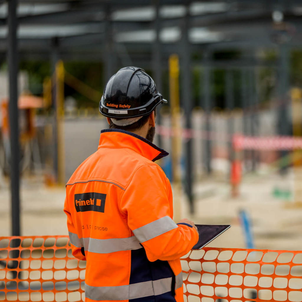 Prime Build general contractor inspecting a site