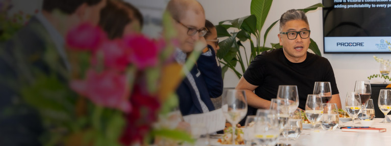 a group of people sitting at a table