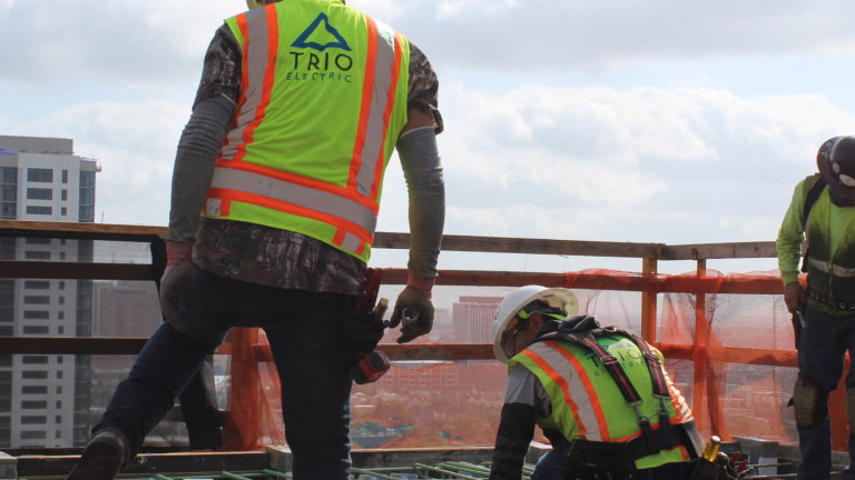 TRIO Electric construction workers on site