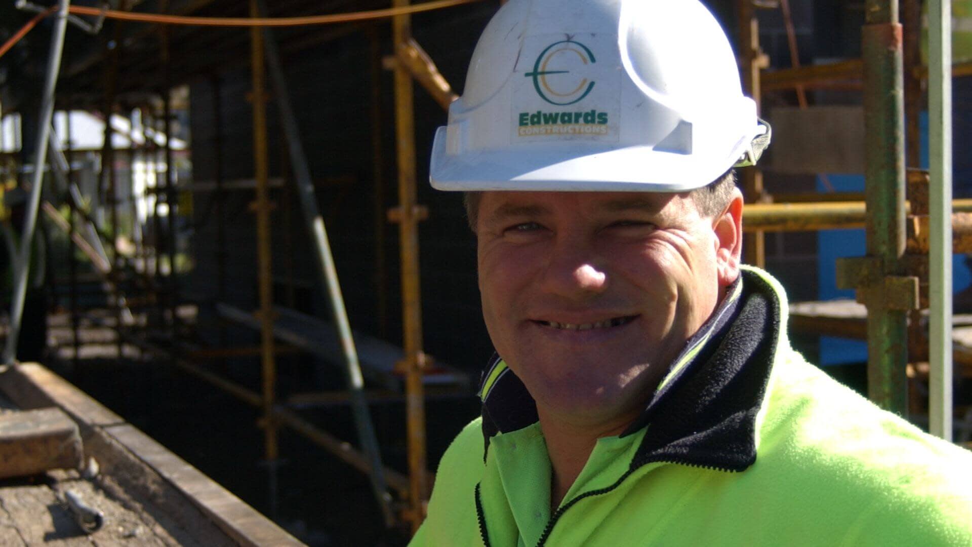 Edwards Construction contractor smiling to the camera