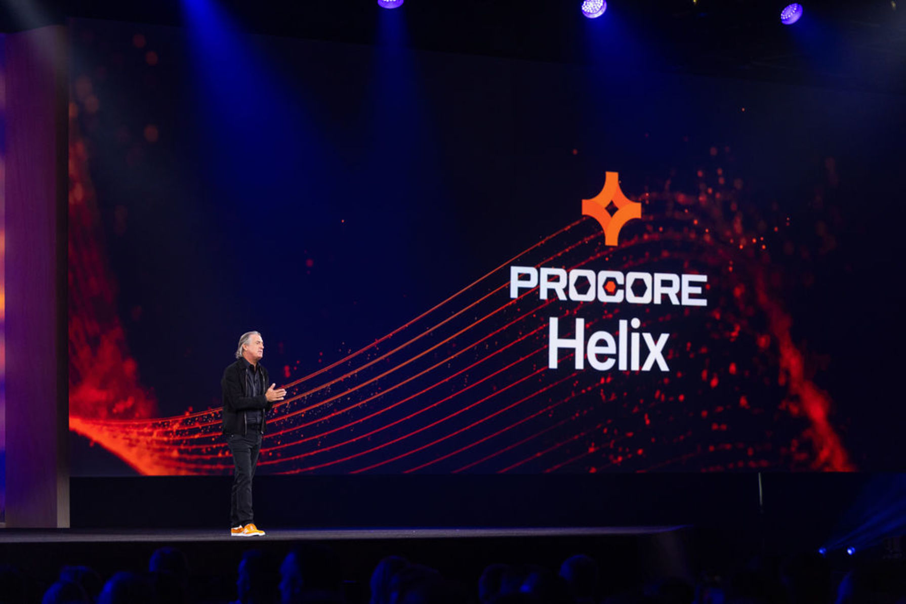 Procore's founder Tooey Courtemanche speaking on the stage at Groundbreak's conference